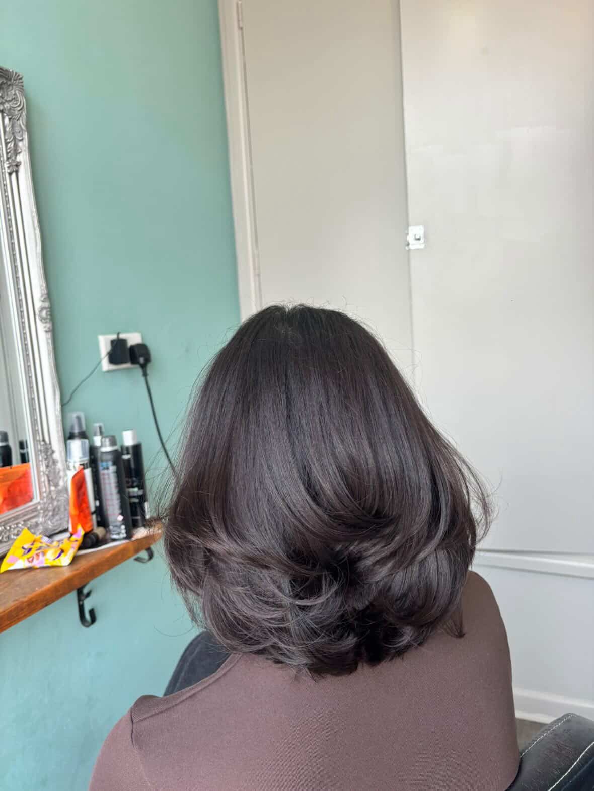 Elegant half-up style with crystal butterfly clip